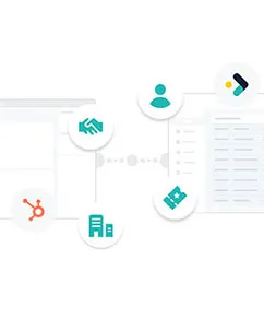 Diagram of the HubSpot logo linked by dotted lines to icons for deals, contacts, companies and tickets, connecting to a second system's record screen