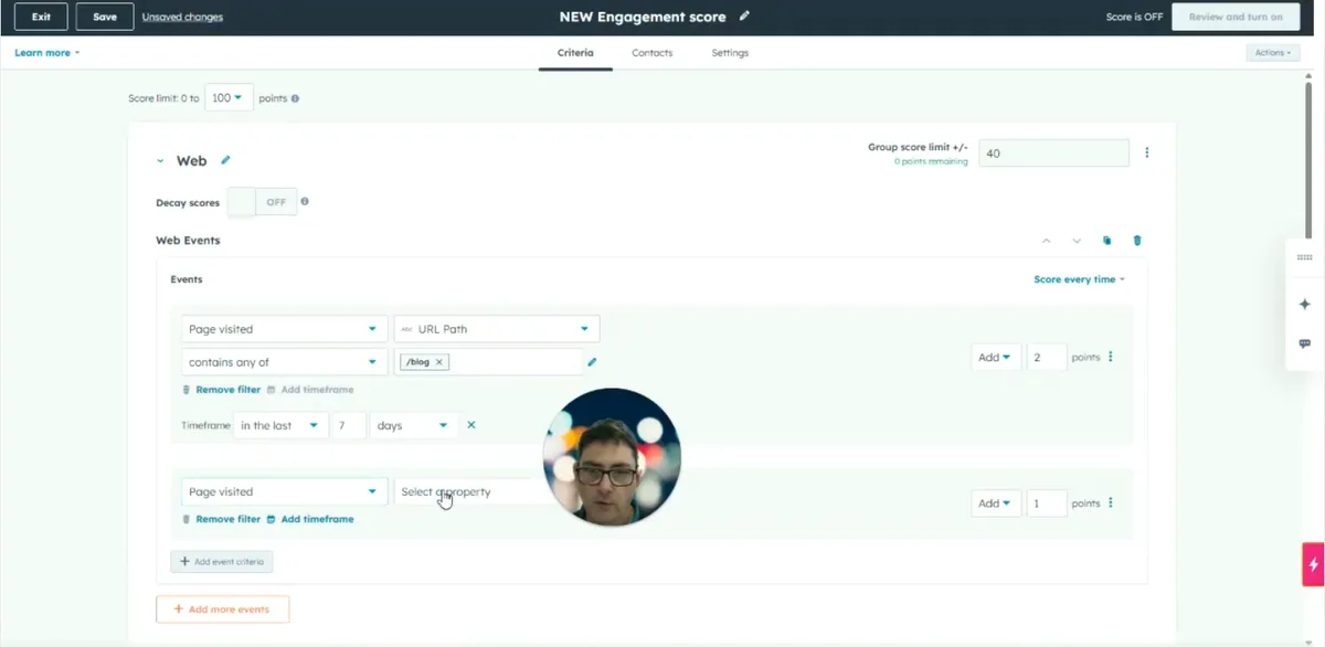 HubSpot's lead score editor for a new engagement score, with a 100-point score limit, a Web group limited to 40 points and a rule giving 2 points for visits to /blog pages in the last 7 days